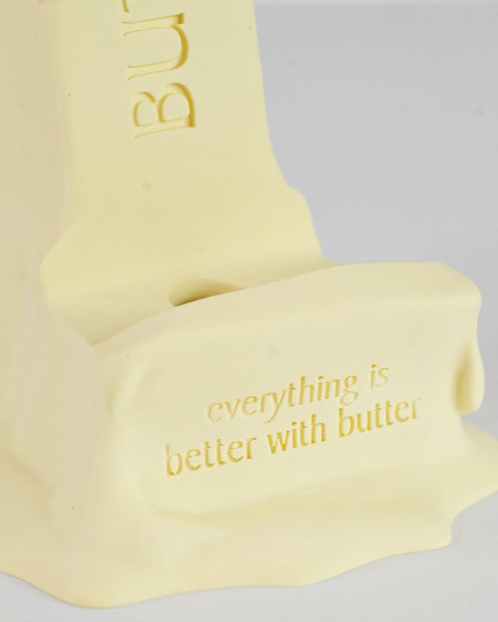 Everything is better with butter, Stick of Butter Cell Phone Stand by Happy Box Designs