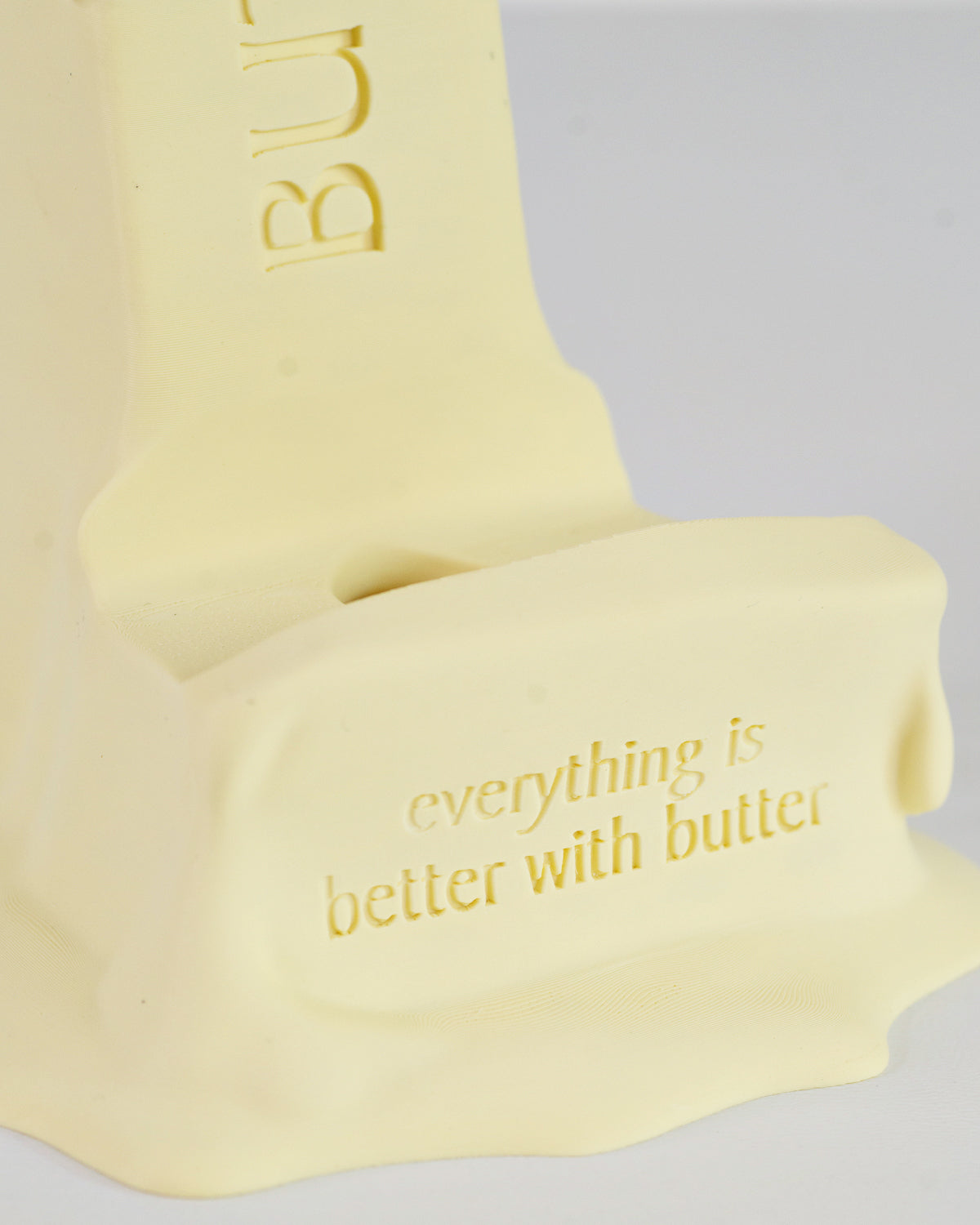 Everything is better with butter, Stick of Butter Cell Phone Stand by Happy Box Designs